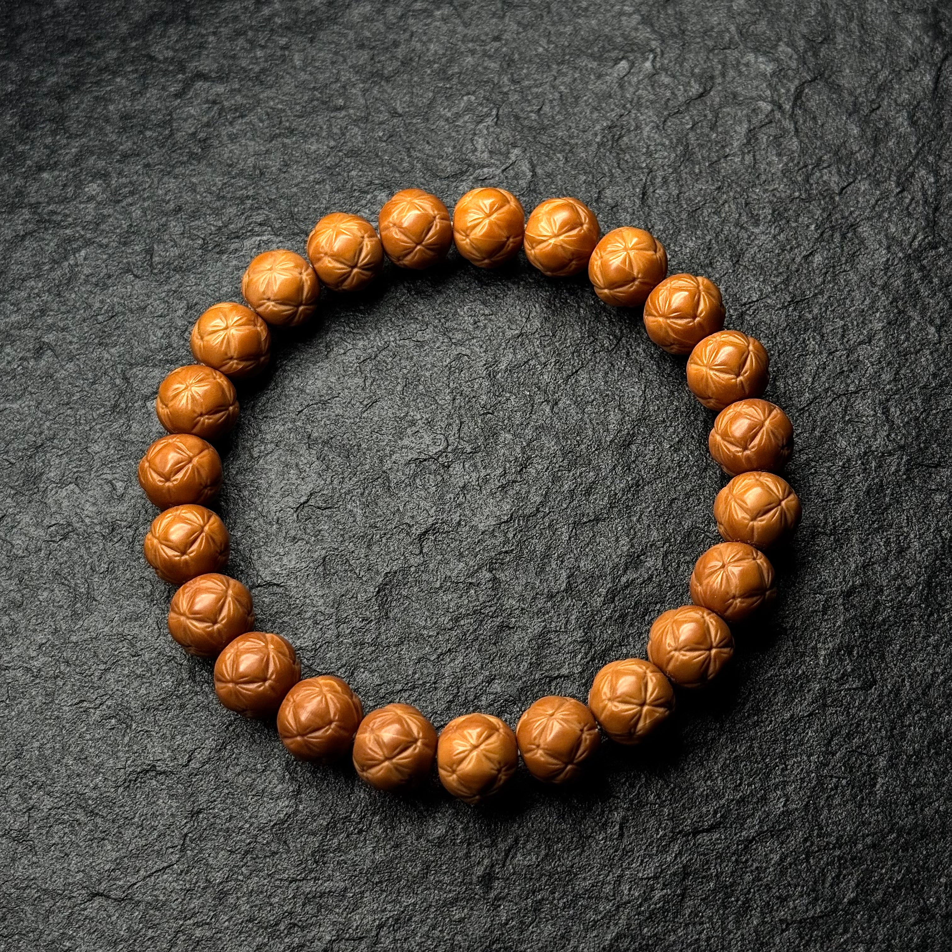Starburst Carved Monkey Head Walnut Bracelet