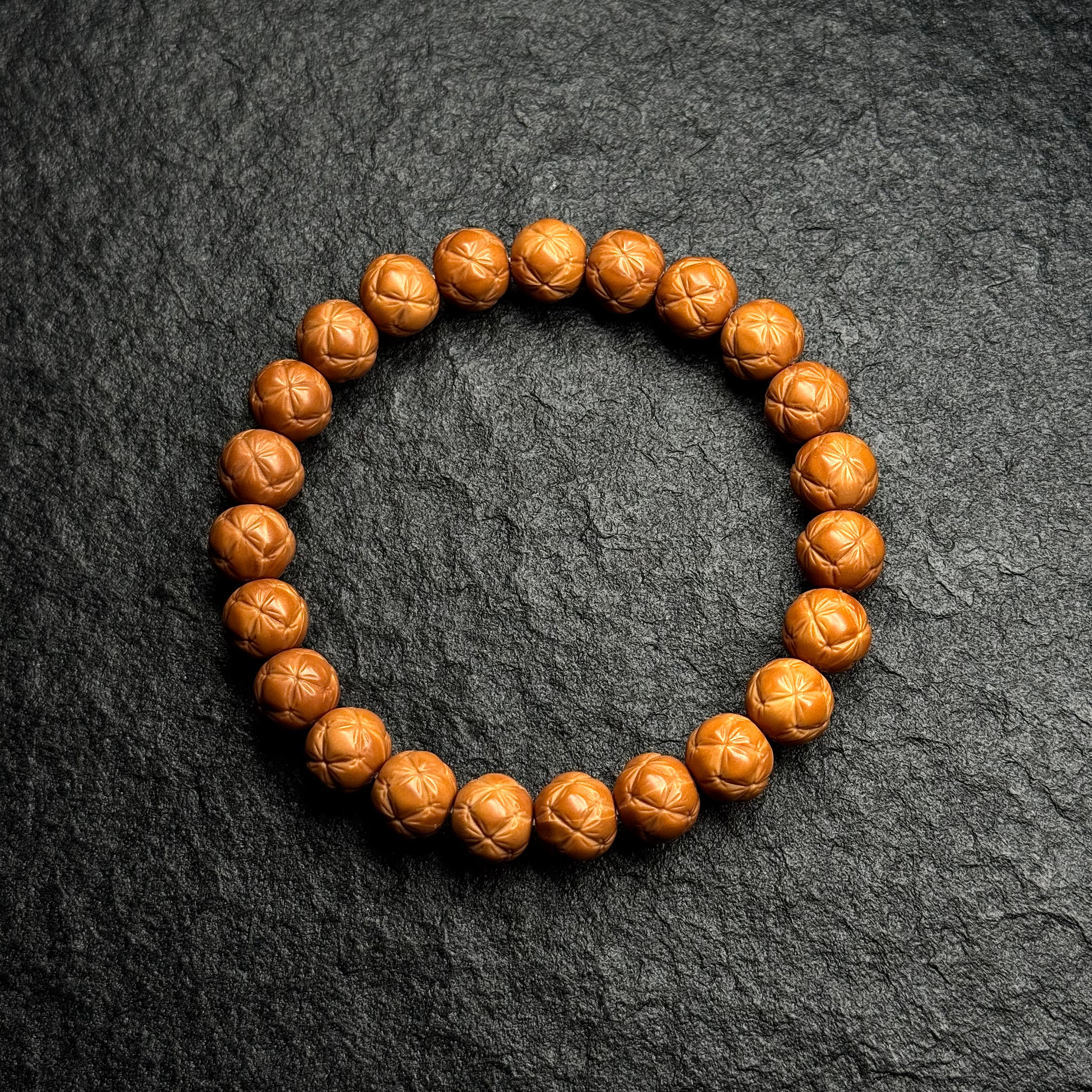 Starburst Carved Monkey Head Walnut Bracelet