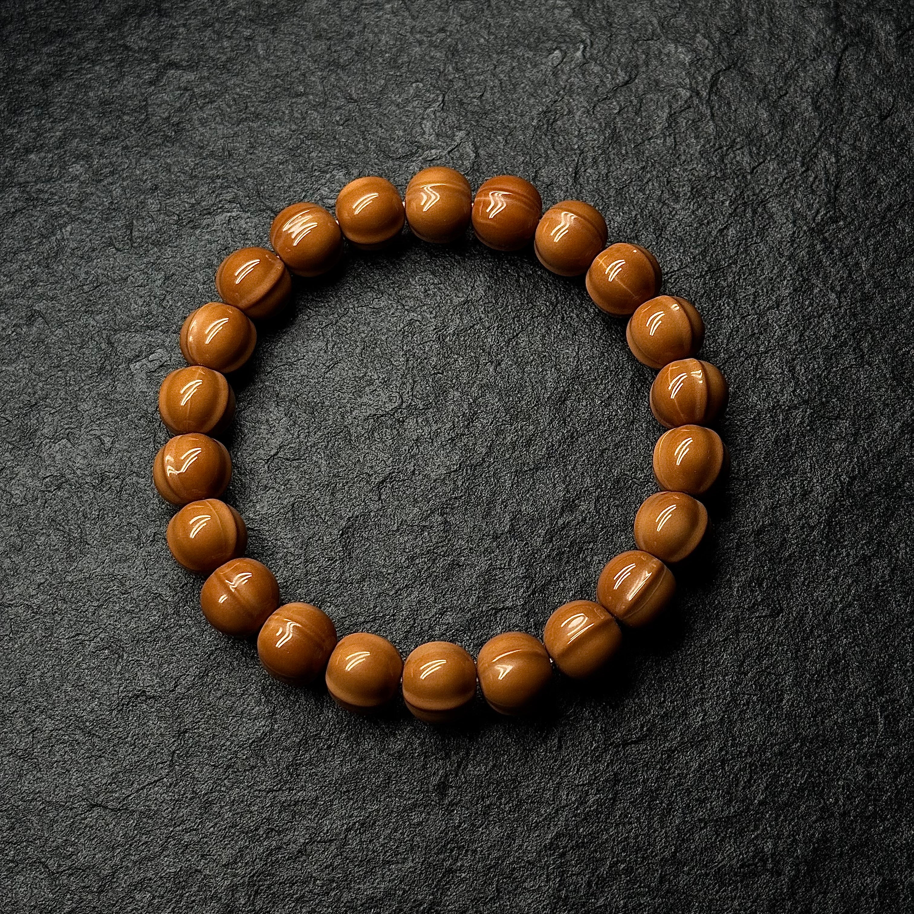 Shark Back Curved Monkey Head Walnut Bracelet