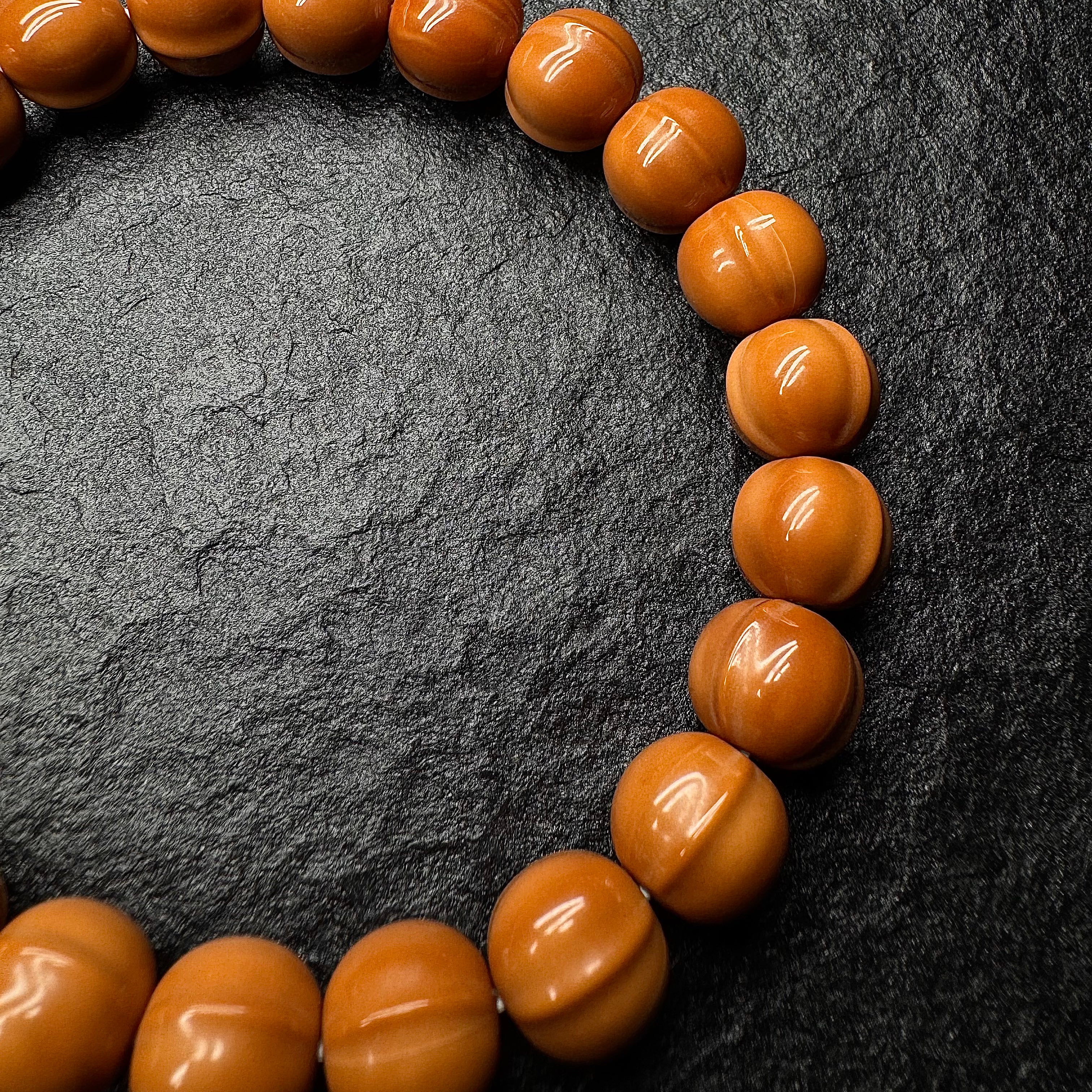 Shark Back Curved Monkey Head Walnut Bracelet