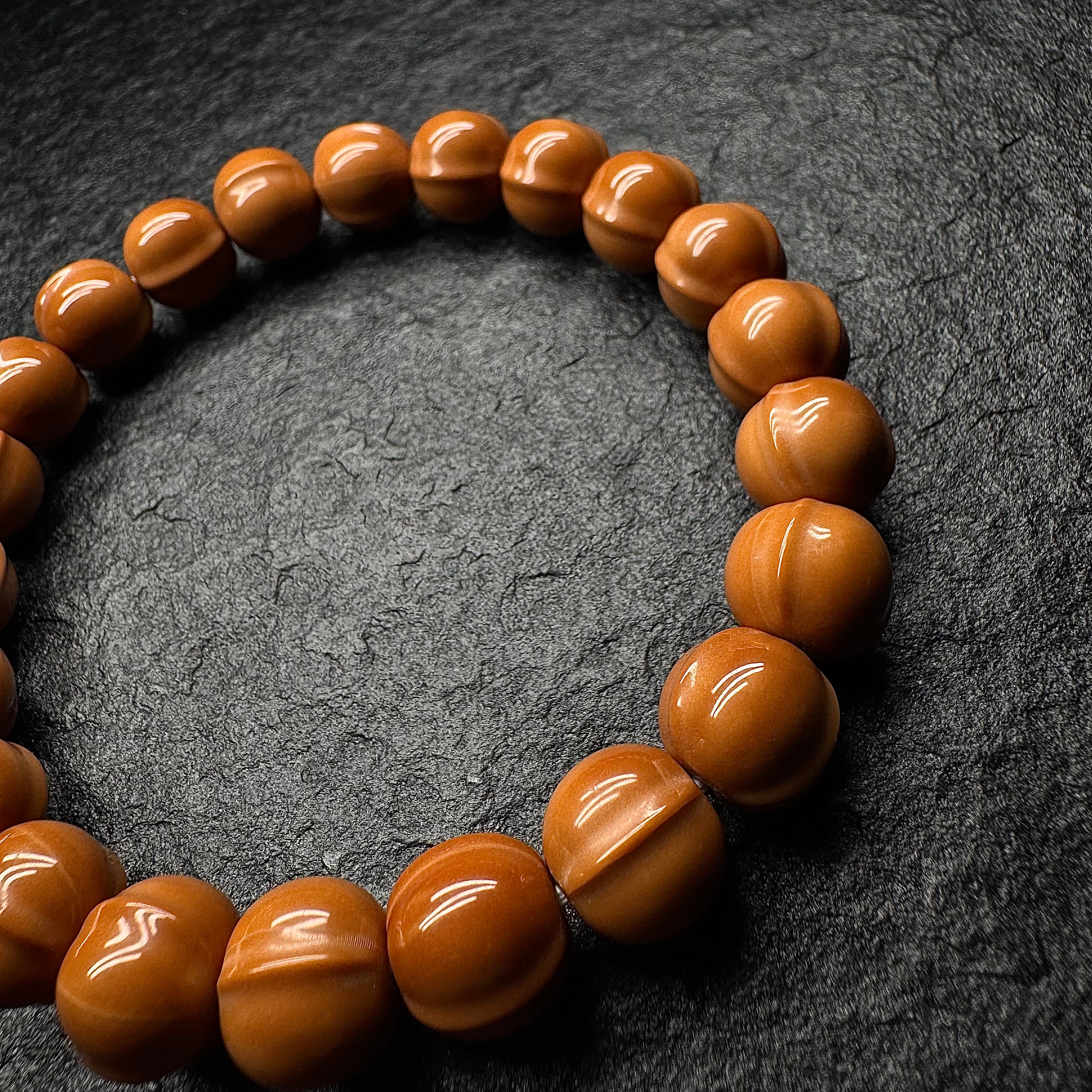 Shark Back Curved Monkey Head Walnut Bracelet