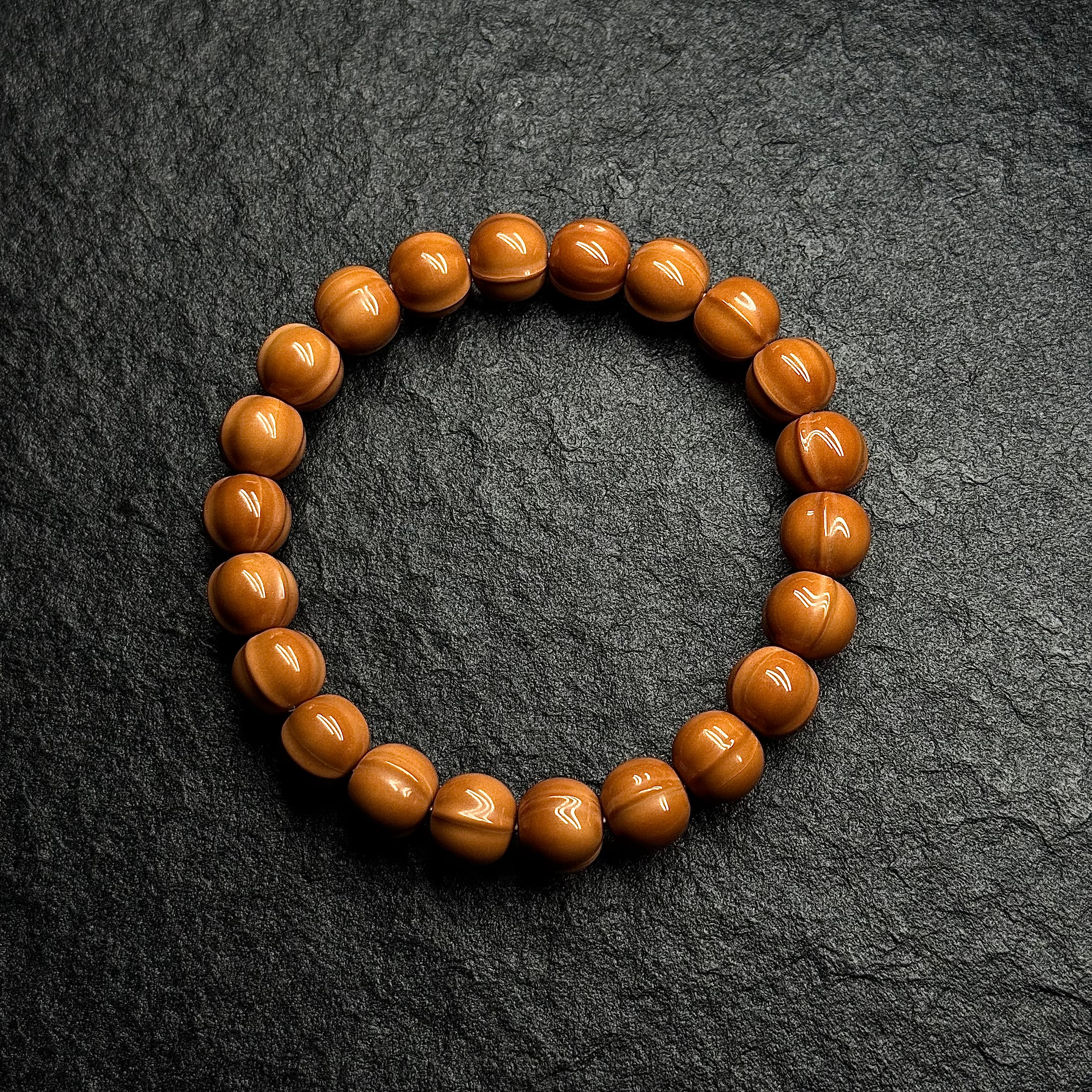 Shark Back Curved Monkey Head Walnut Bracelet